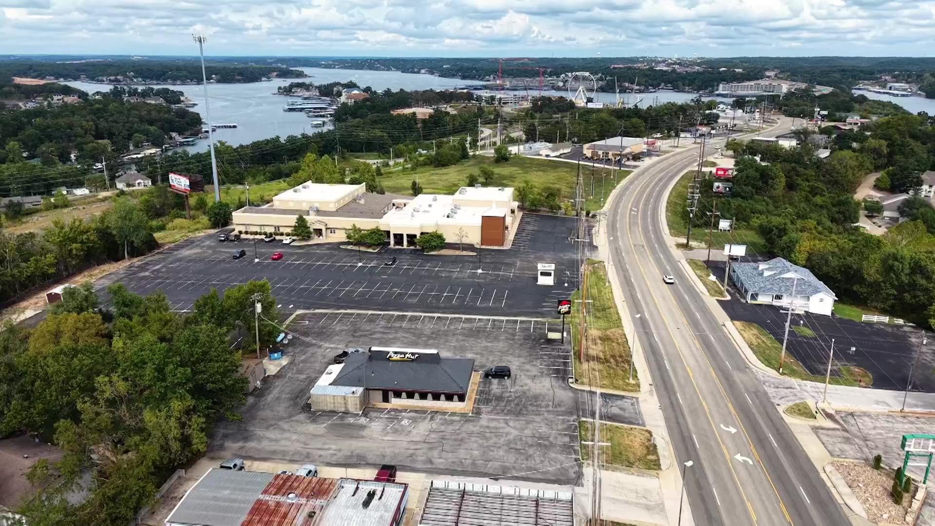 Drone view of the Osage Beach Parkway corridor and the lake near 5231 Osage Beach Parkway