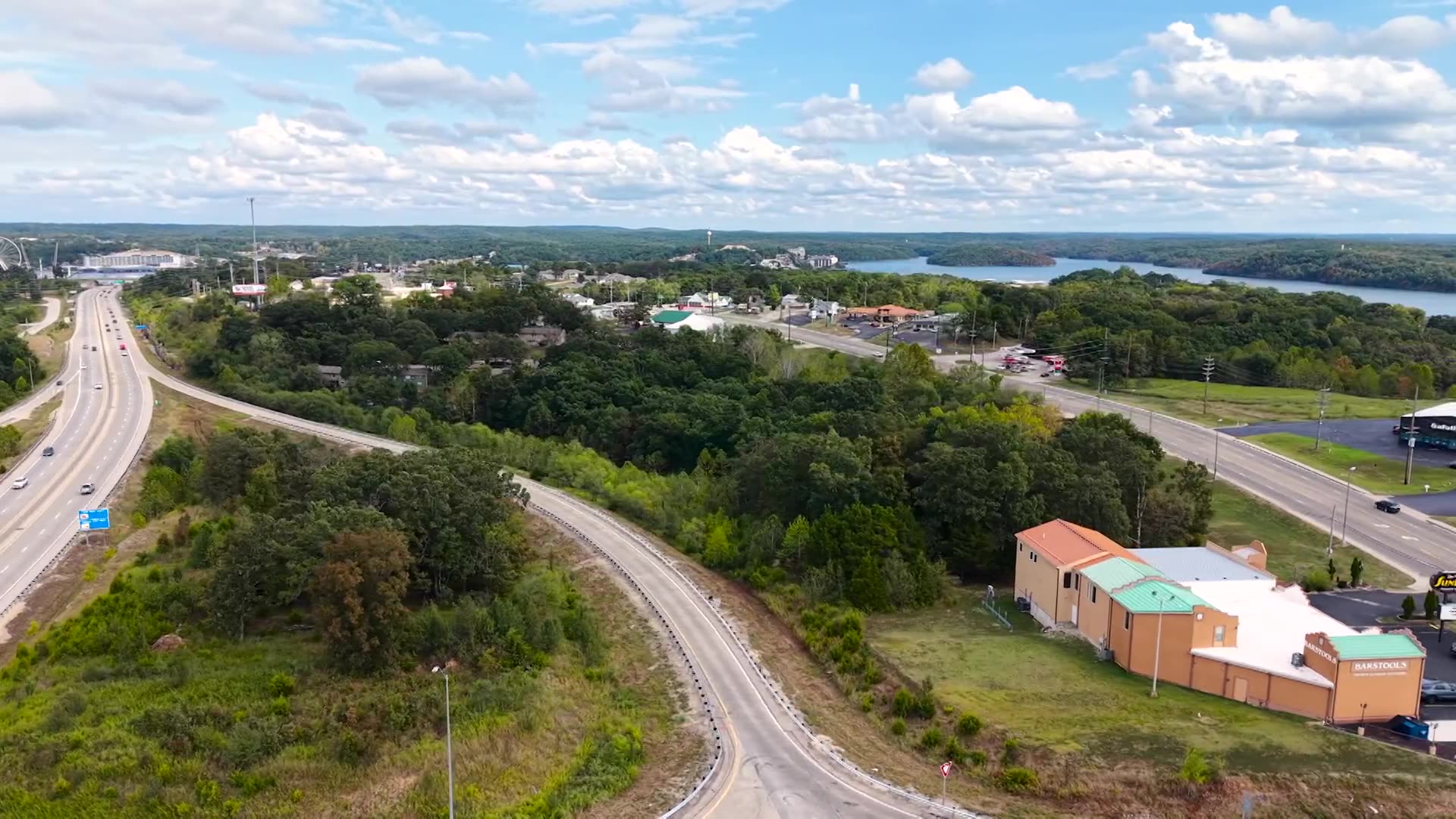 Drone view of Highway 54 and the lake near the Broadwater Bay vacant land
